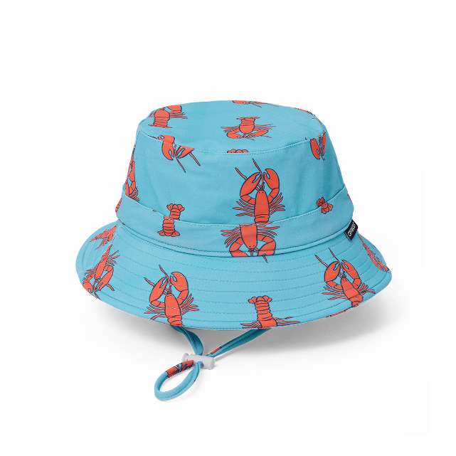 Blue bucket hat with red lobster pattern on a white background