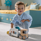 Child playing with the JANOD Car Carrier with Vehicles