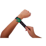 Child putting on the IS GIFT Dinosaur Slap Bands black