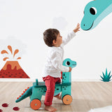 Child riding the JANOD Dino Ride On Portosaurus
