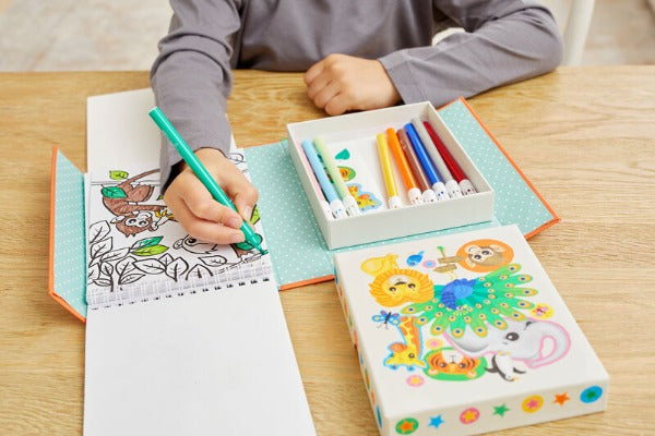 Child colouring in the TIGER TRIBE Colouring Set - Zoo
