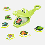 Crocodile toy catching frogs