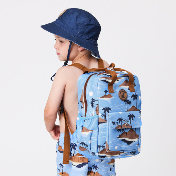 Boy wearing CRYWOLF Mini Backpack - Blue Lost Island side view