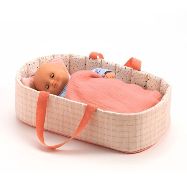 Doll sleeping in DJECO Pink Lines Doll Bassinet