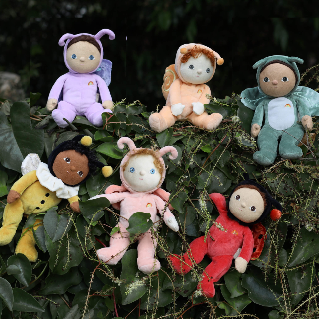 6 Backyard Buddies sitting in the bushes