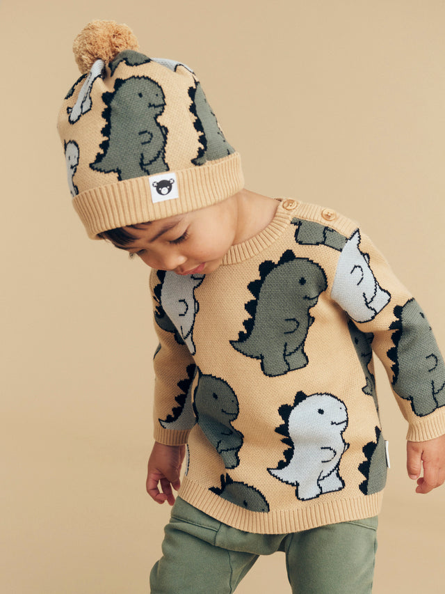 Child wearing HUXBABY T-Rex Knit Jumper and matching beanie