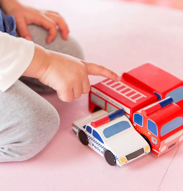 Child pointing to the Make Me Iconic Fire Truck