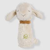 Plush toy lamb with a brown scarf on a white background