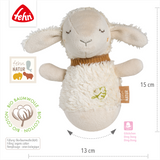 Plush toy sheep with organic cotton label on a white background