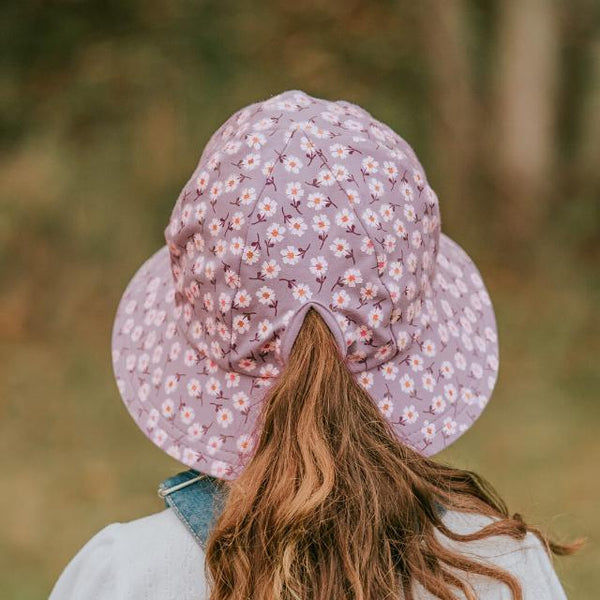 Back view of girl wearing BEDHEAD HATS Ponytail Bucket Sun Hat - Lana