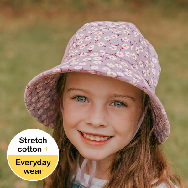 Girl wearing BEDHEAD HATS Ponytail Bucket Sun Hat - Lana