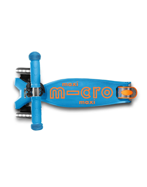 Blue scooter with 'maxi micro' branding on a white background
