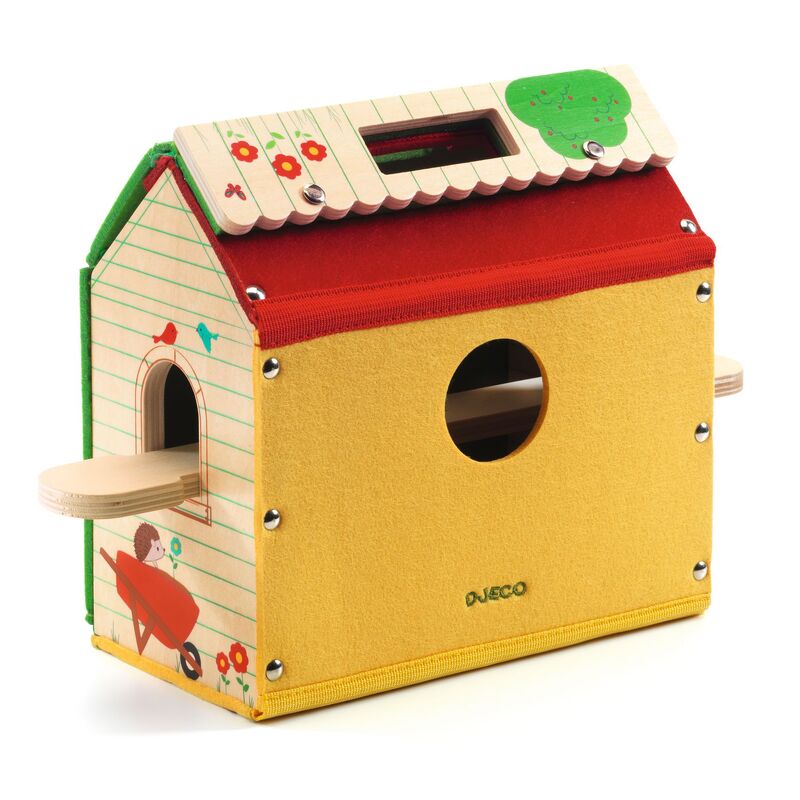 Colorful wooden toy house with a red roof and yellow body on a white background