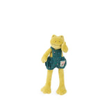 Green velvet toy frog wearing overalls