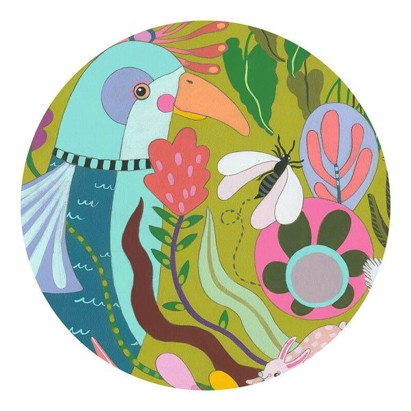 Colourful illustration of a toucan and tropical plants on a circular background