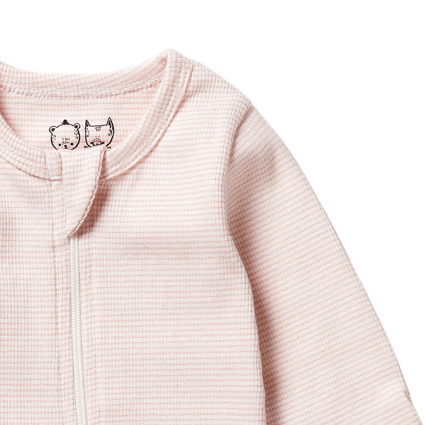 Detail view of soft pink stripe and neck opening cover on the WILSON & FRENCHY Organic Stripe Rib Zipsuit with Feet - Cantaloupe