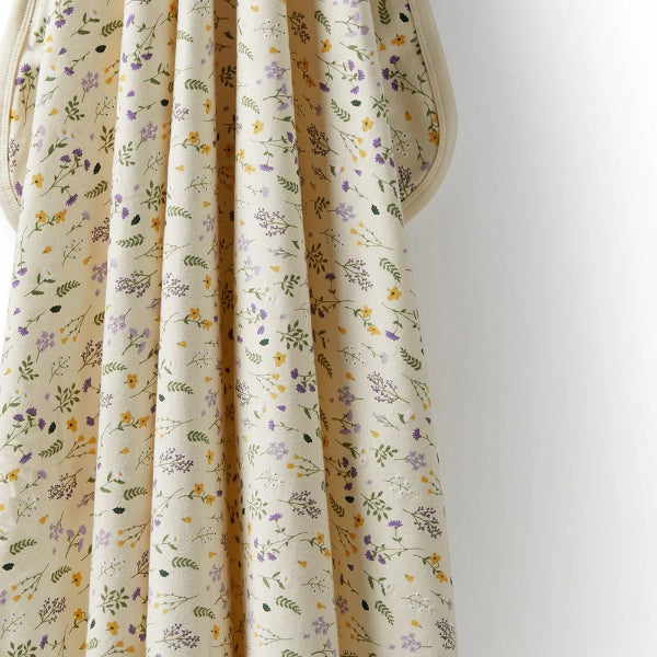 Detailed view of print on the WILSON & FRENCHY Bella Floral Organic Bunny Rug