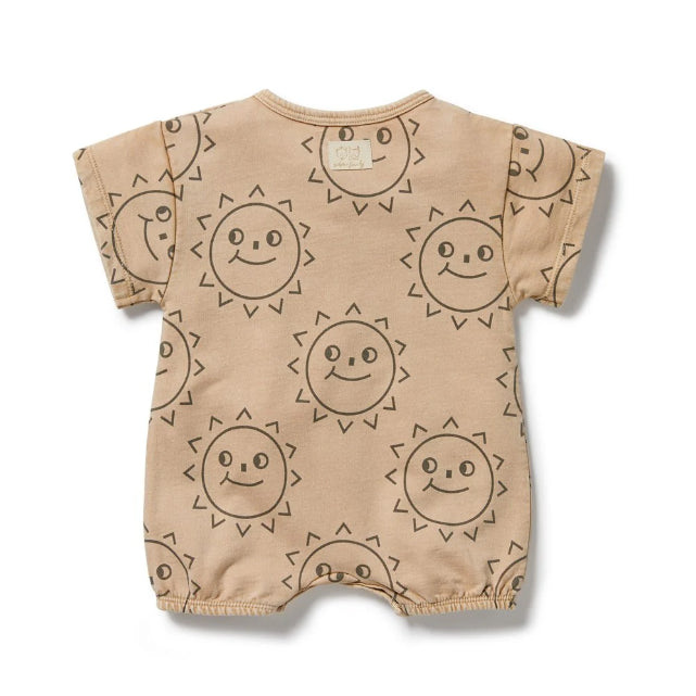 Back of Beige baby romper with sun pattern on a white background