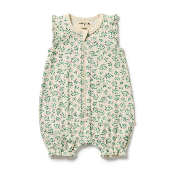 Baby romper with green floral pattern on a white background