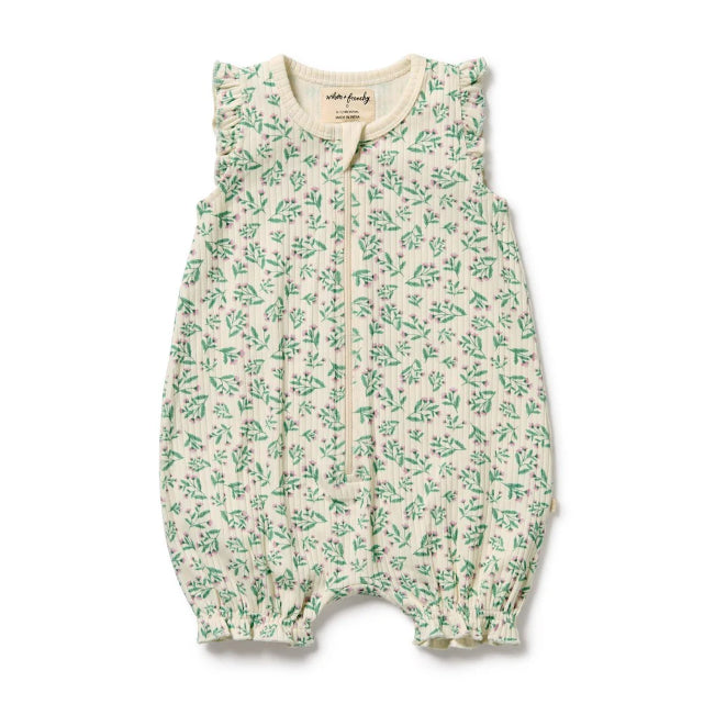 Baby romper with green floral pattern on a white background