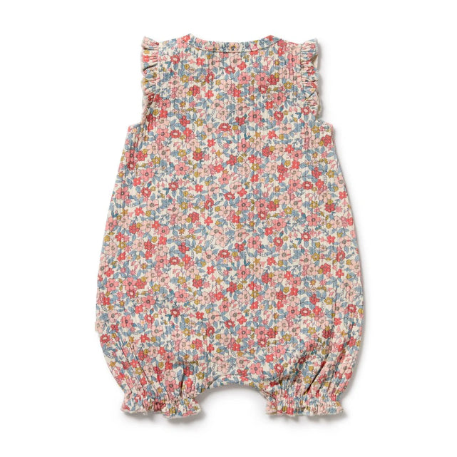 Back of Floral baby romper on a white background