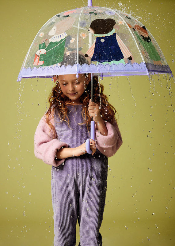 Child standing under DJECO Musicians PVC Child Umbrella