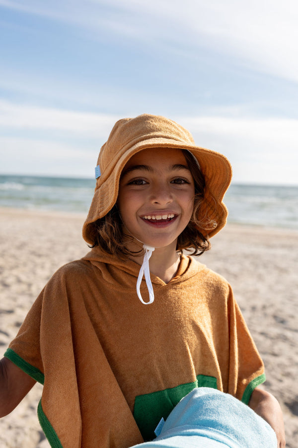 BOY AT BEACH WEARING ACORN Terry Towelling Bucket Hat - Caramel