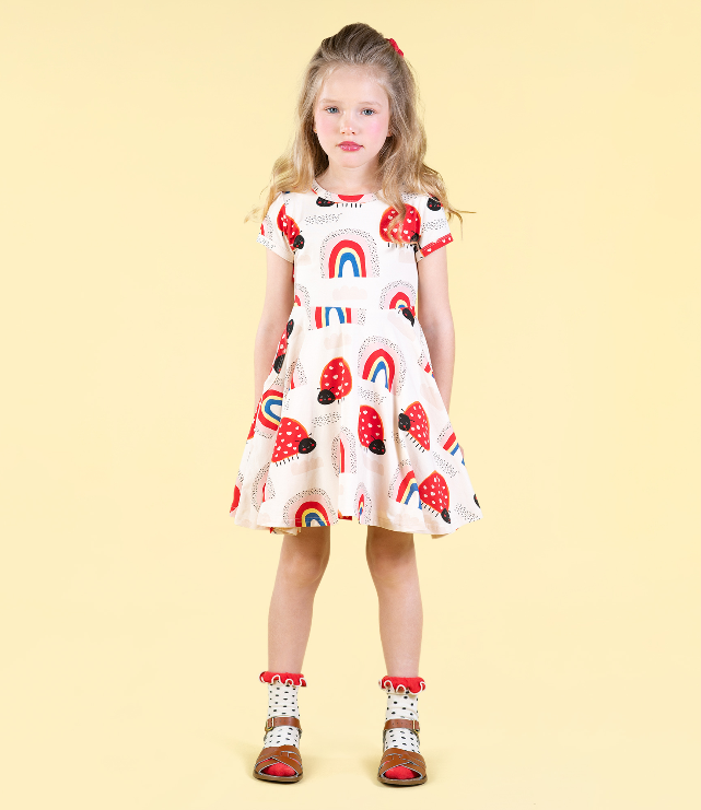 GIRL WEARING ROCK YOUR BABY Love Bug Rainbow Waisted Dress