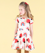 DETAIL SHOT OF GIRL WEARING ROCK YOUR BABY Love Bug Rainbow Waisted Dress