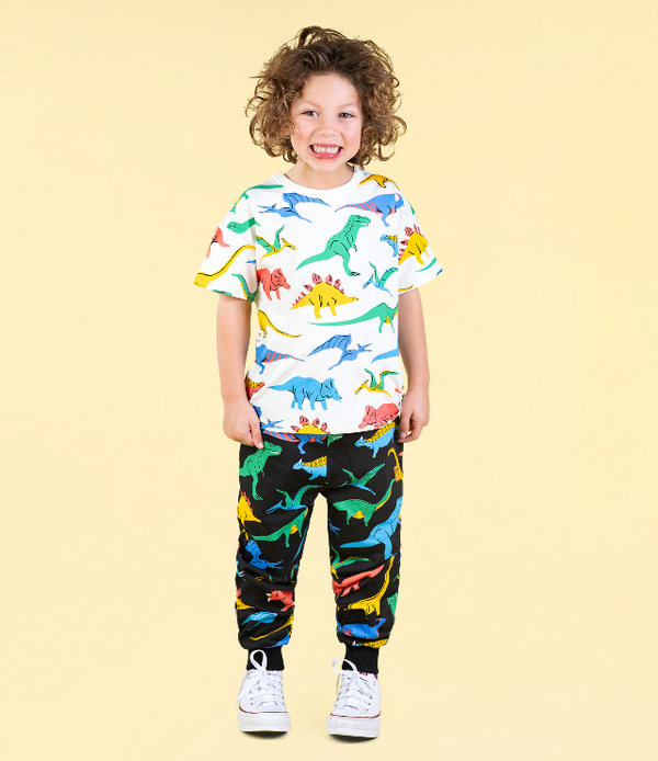 BOY WEARING ROCK YOUR BABY Dino Bright T-Shirt AND TRACK PANTS