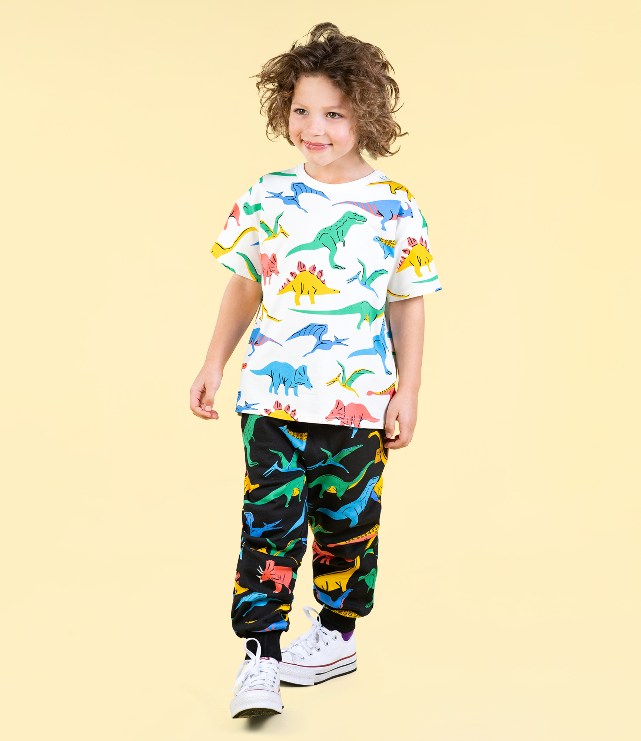 BOY WEARING ROCK YOUR BABY Dino Bright T-Shirt AND TRACK PANTS