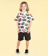 BOY WEARING ROCK YOUR BABY Cars T-Shirt AND BLACK SHORTS AND SHOES