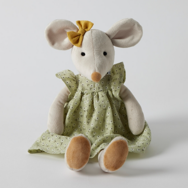 Stuffed mouse toy with a green dress and yellow bow on a white background