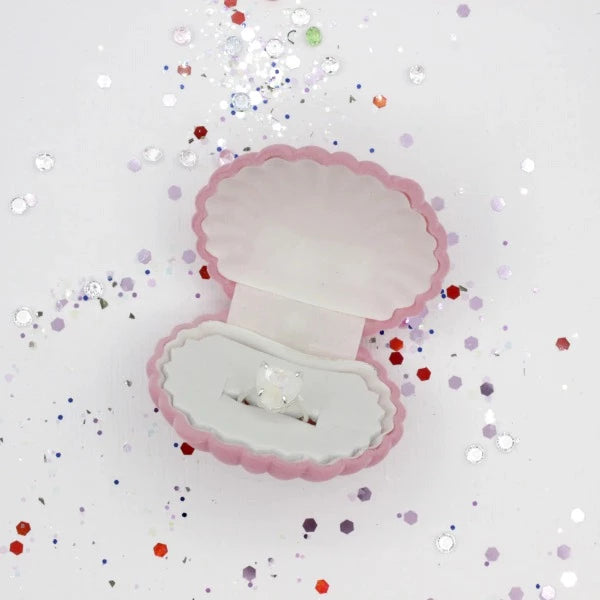 LAUREN HINKLEY Heart of the Ocean: Sparkle Ring sitting in a pink velvet shell box