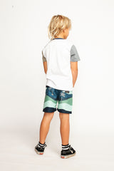 Back view of boy wearing MUNSTER KIDS Switch It Tee - White