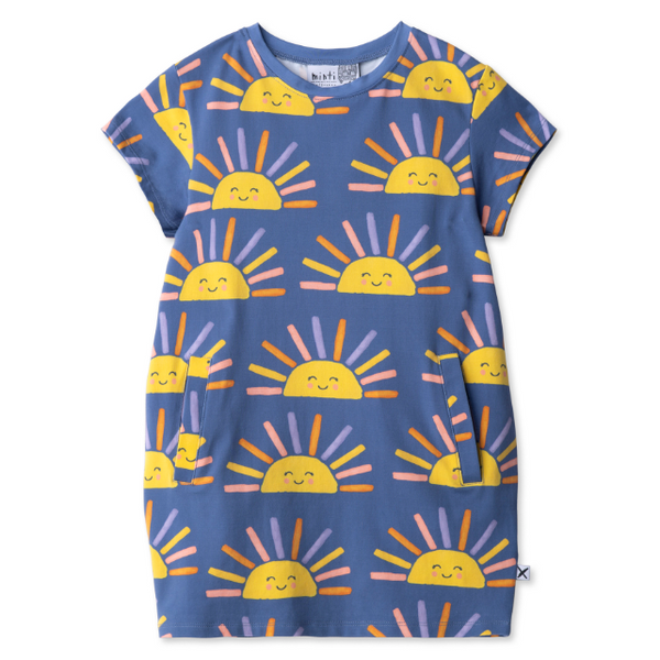 Children's dress with sun pattern on a blue background