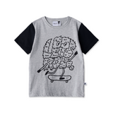 Gray t-shirt with black sleeves and a graphic of a fluffy creature on a skateboard on a white background