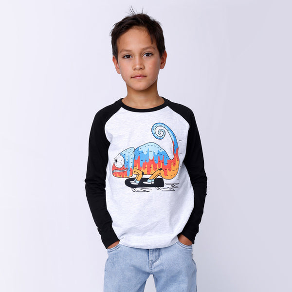 Boy standing with hands in pockets wearing MINTI Speedy Chameleon Tee