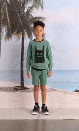 Boy  wearing the MINTI Blasted Ace Short and Scribble Monster Crew