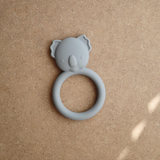 Silicone ring with koala design on a beige background