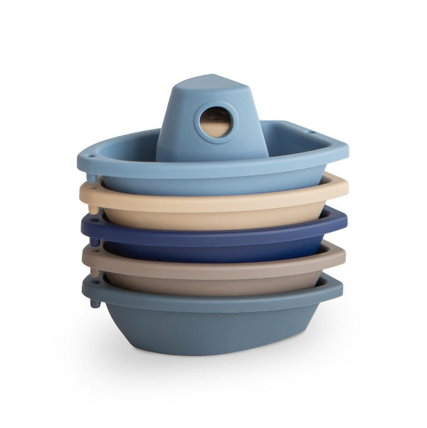 Stack of blue and beige bath boats 