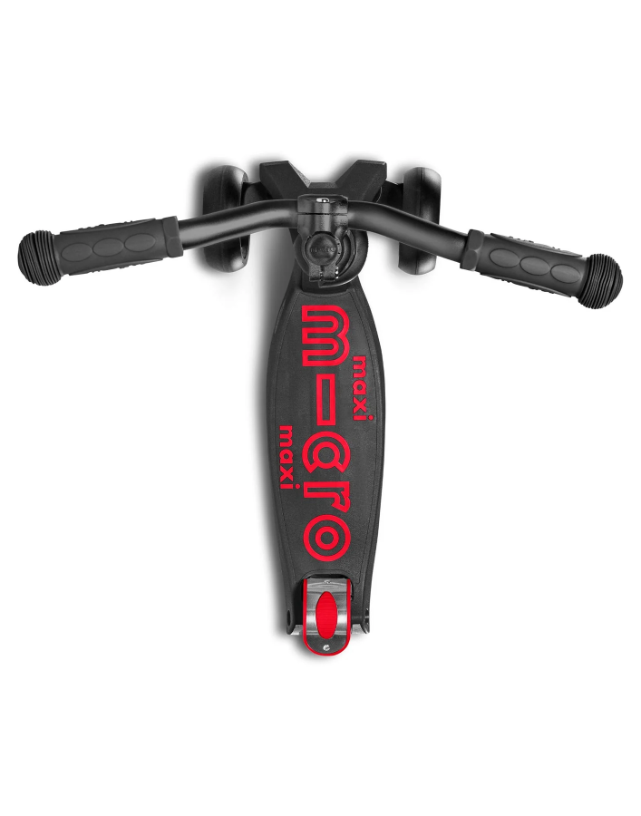 Black scooter with red 'maxi micro' branding on a white background