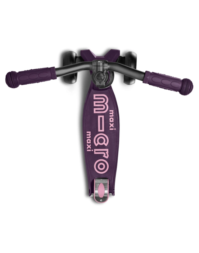 Purple scooter with 'maxi micro' branding on a white background