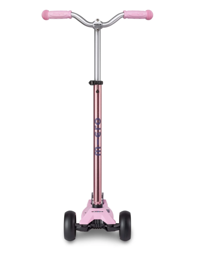 Pink scooter with rose gold frame on a white background
