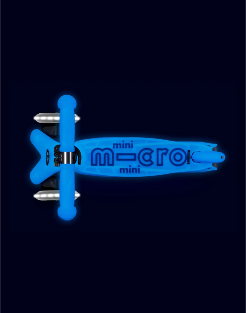 Blue 'mini micro' scooter on a black background