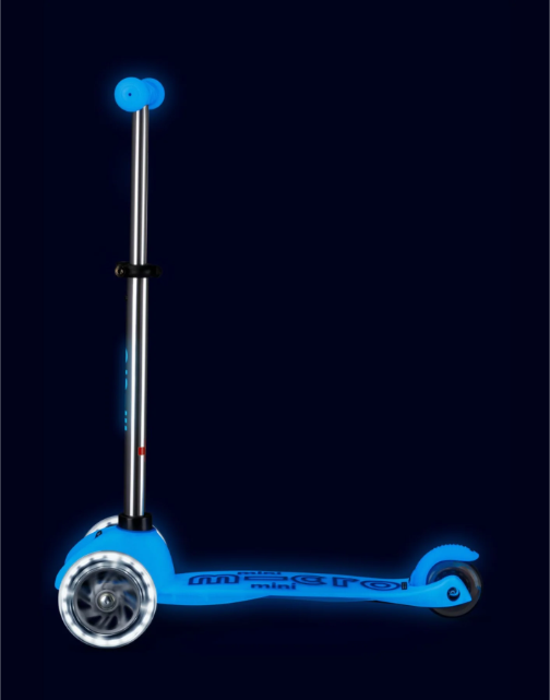 Blue scooter with glowing wheels on a black background