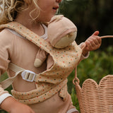 Child carrying dozy doll in the OLLI ELLA Dinkum Dolls Carrier - Gumdrop
