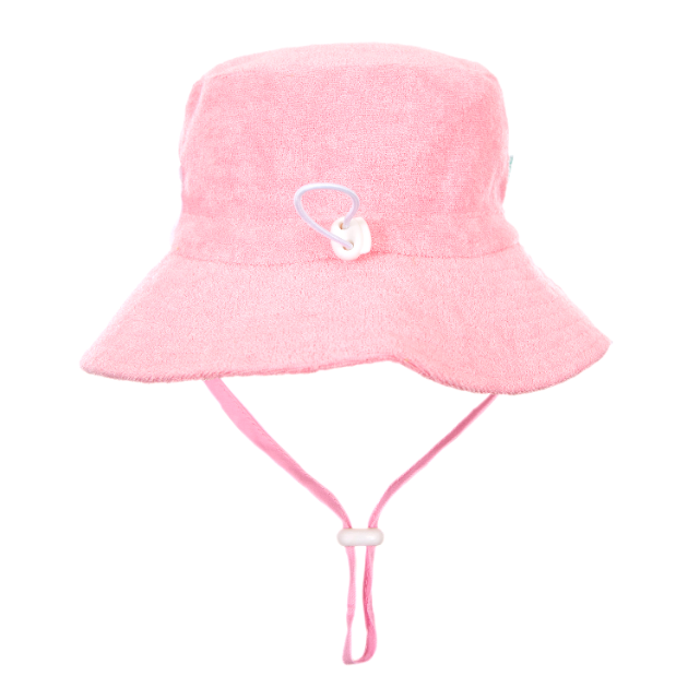 Pink bucket hat with chin strap on a white background
