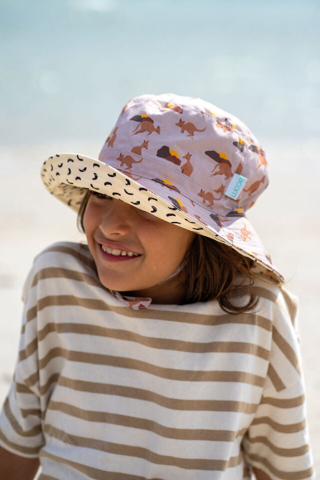 CHILD WEARING ACORN Aussie Sunset Wide Brim Bucket Hat