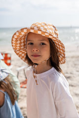 CHILD WEARING ACORN Checkmate Wide Brim Bucket Hat